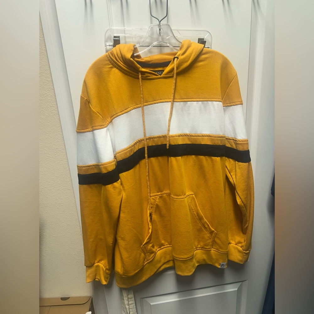 Free Planet Yellow Hoodie with White and Black Accents